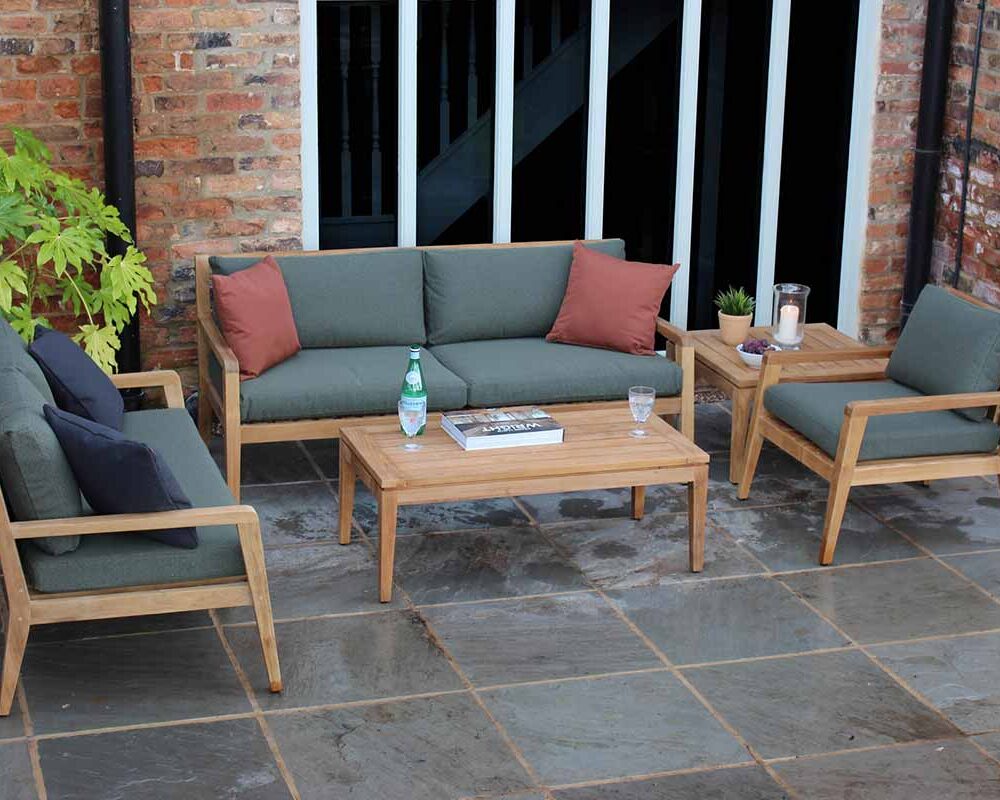 menton outdoor seating range - teak - large sofa, sofa, armchair, coffee table and side table.