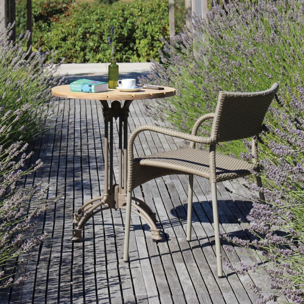 Rollo outdoor dining armchair - kubu, antibes teak top, pigalle table base