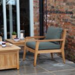 menton outdoor armchair with pads in solent moss - mood