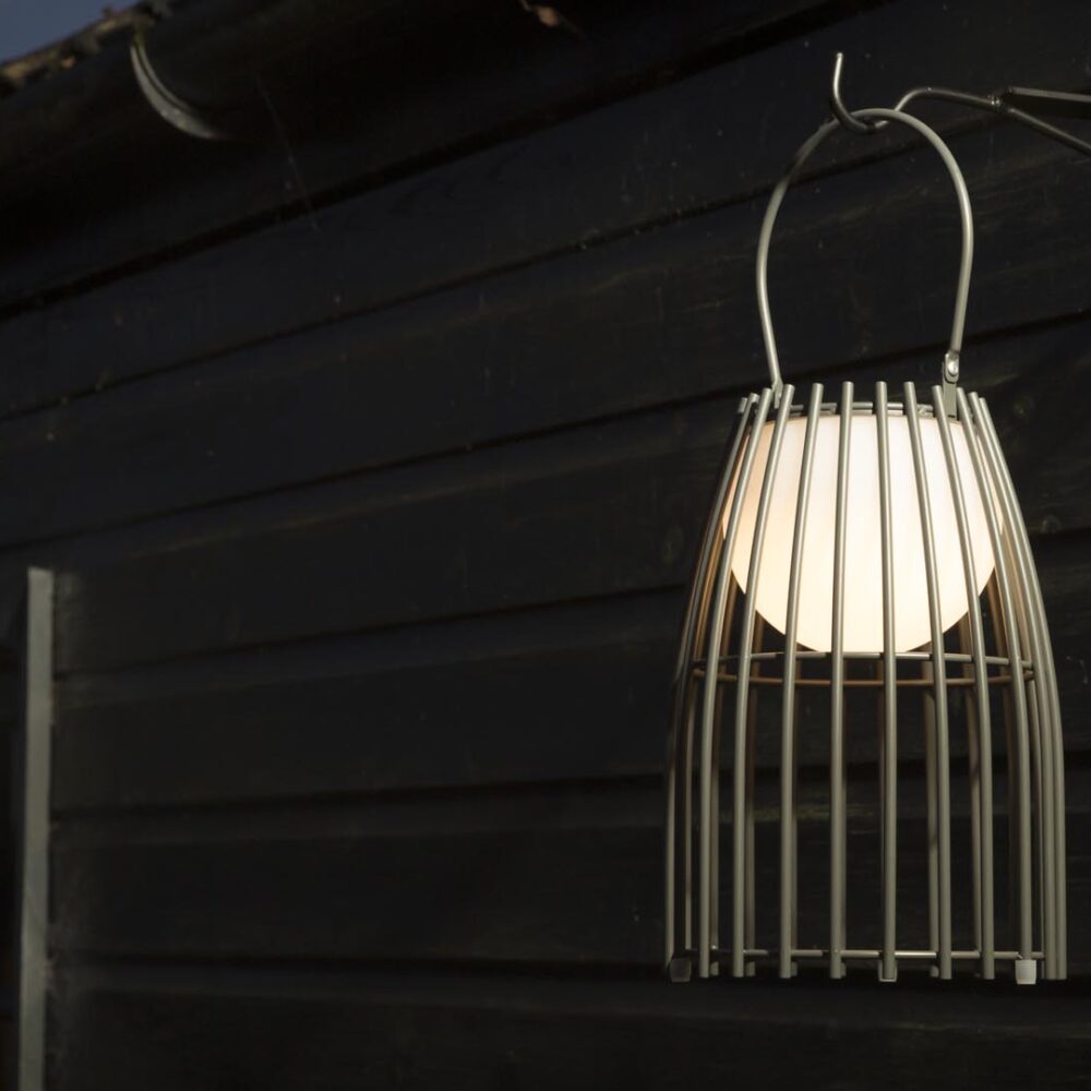 portman LED outdoor lanterns - kubu - hung from an exterior bracket
