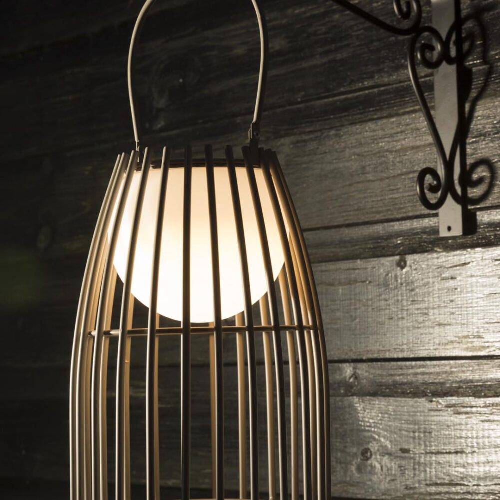 portman LED outdoor lanterns - kubu - hung from an exterior bracket