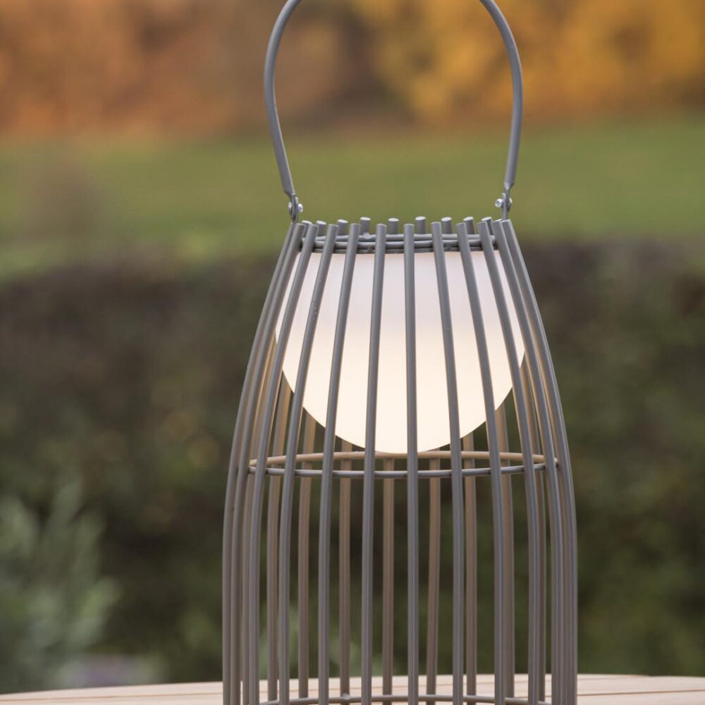 portman LED outdoor lanterns - anthracite, used on an outdoor table