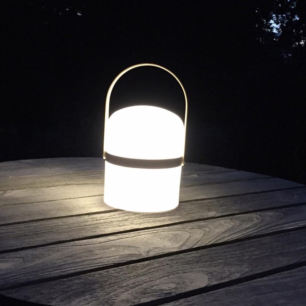 st ives outdoor led lantern - mood - on an exterior table at night