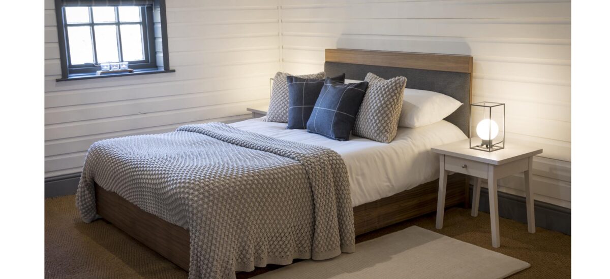 walter double bed - walnut / upholstered headboard, tenby bedsides, tiree throws & cushions and kew table lamps