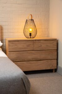 ark chest of drawers - natural finish with cage large table lamp