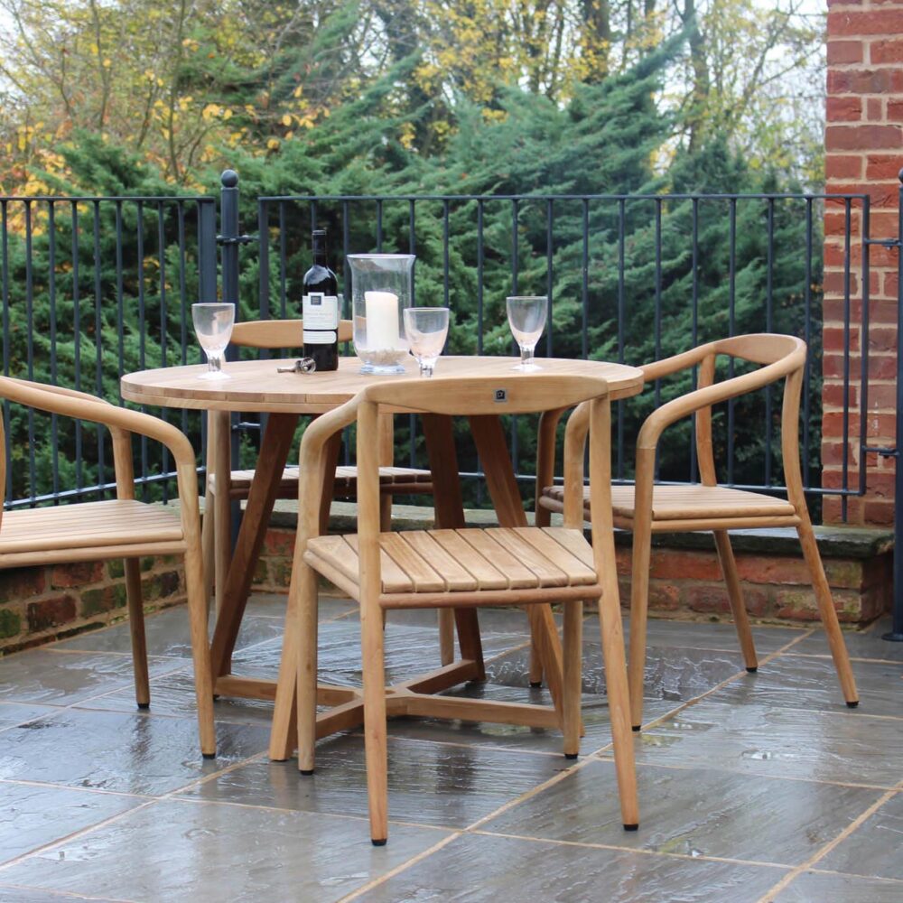 dessau outdoor dining chairs with kinsale 110cm dining table - mood shot with bonfeur