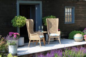 madagascar high back armchair with pads in cap ferret + kinsale 60cm outdoor table