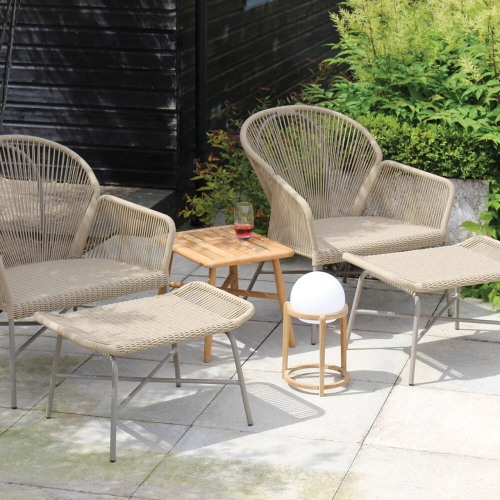 miyako easy chairs and footstools with miyako table and luna led light and stand