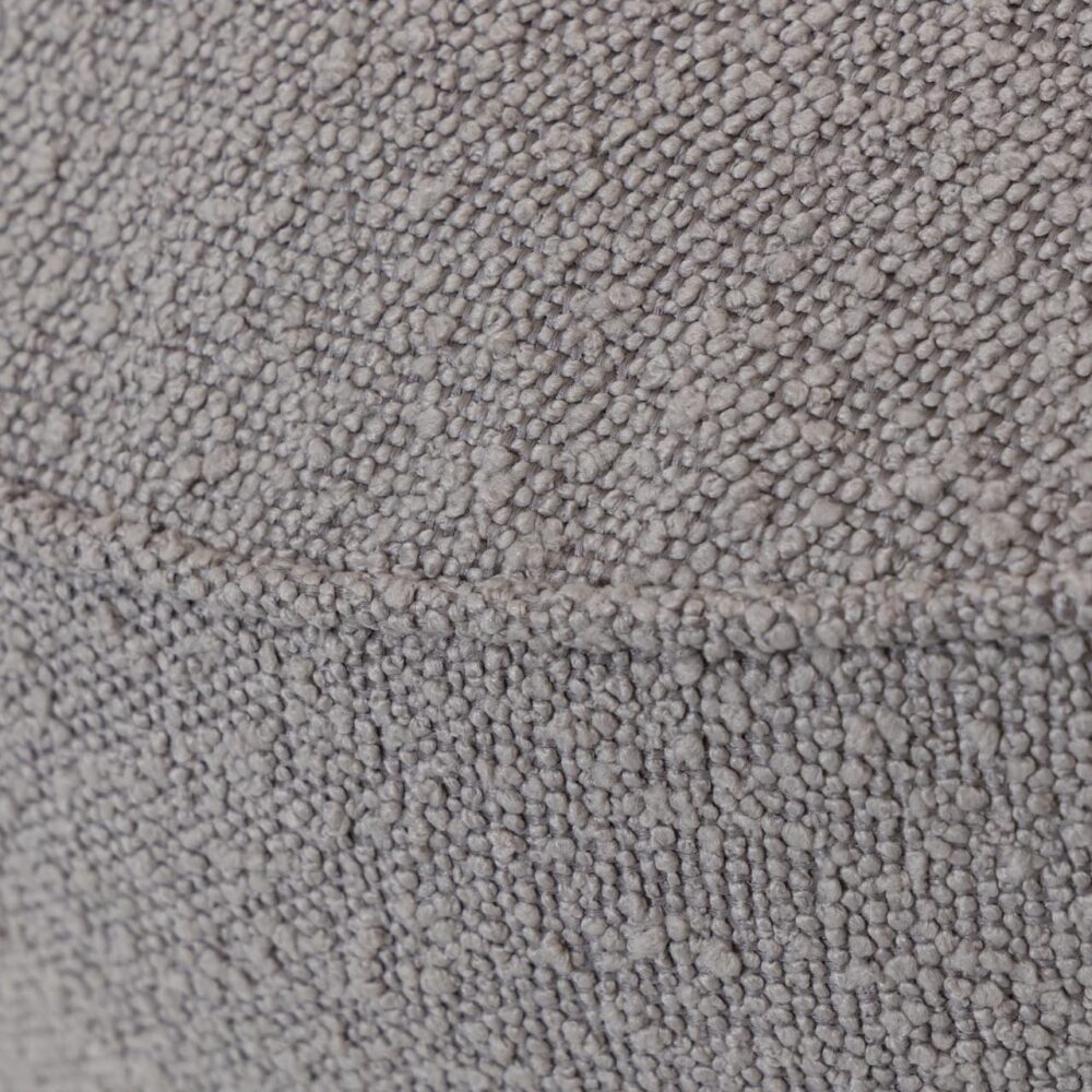 toulon upholstered pouffe - boucle - piping detail