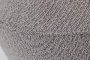 toulon upholstered pouffe - boucle - piping detail