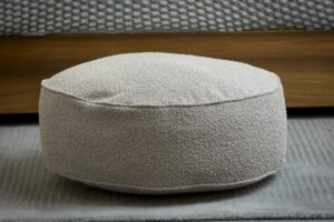 toulon upholstered pouffe - circular pouffe with fibre inner