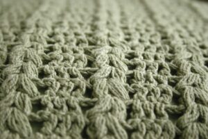 45cm crochet cushion cover - prairie green - detail shot