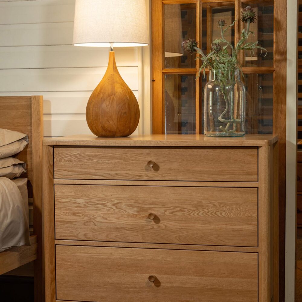 guest chest of drawers - oiled oak. shown with bulb lamp medium and ghent vase