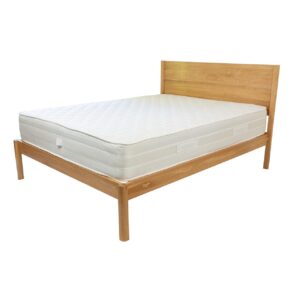 guest solid oak bed frame - king size shown with a premium pocket spring mattress