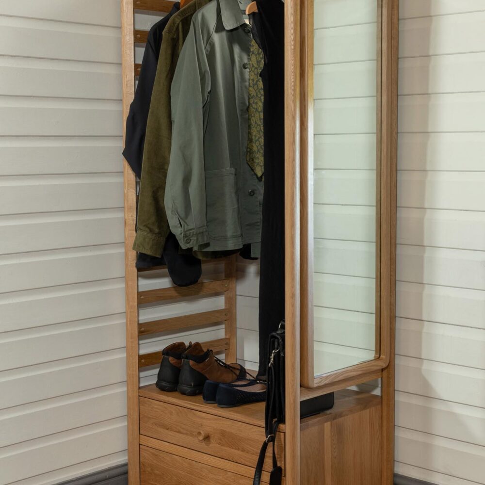 guest open wardrobe - oiled oak - open wardrobe with clothes rail, drawer and hanging pegs - shown with hanging