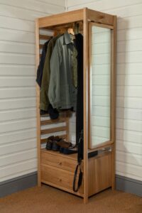 guest open wardrobe - oiled oak - open wardrobe with clothes rail, drawer and hanging pegs - shown with hanging