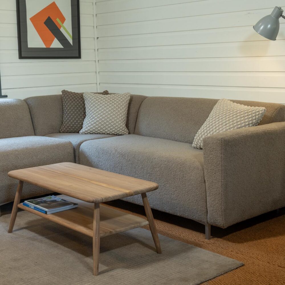 mode sectional seating - example of a corner set up - upholstered in the uk - shown in pelage clay. bruges lamp, shoreditch coffee table and stitch rug also pictured
