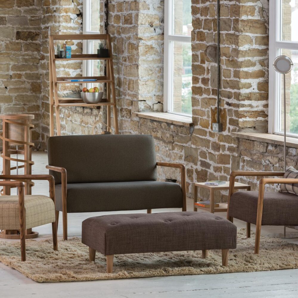 shoreditch 100cm sofa, armchair & highback armchair, totem tall shelf unit, coil lamp & chiswick 100cm coffee table / footstool, mane rug, coil & magna floor lamps.