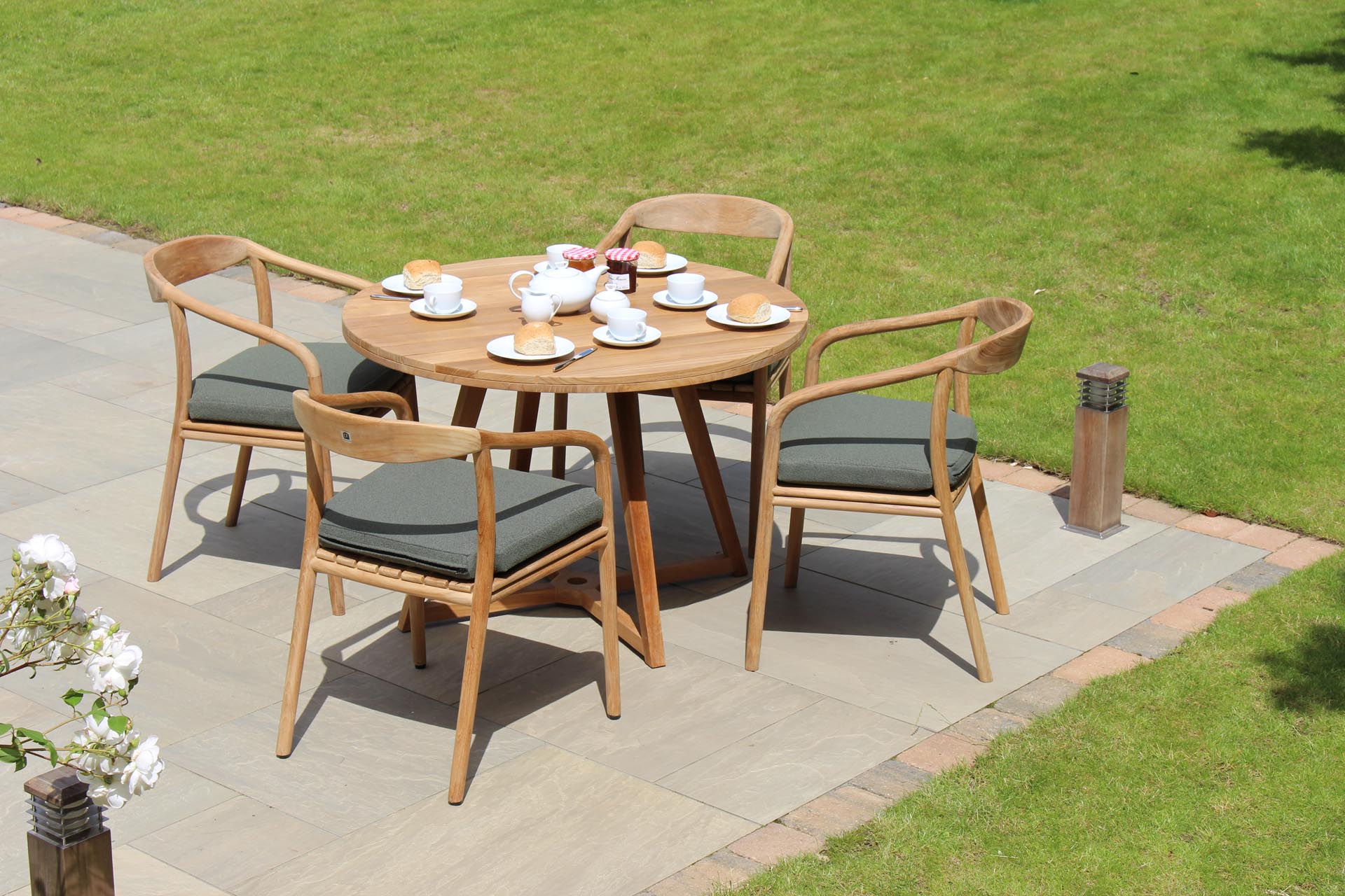kinsale 110 dining table, dessau outdoor dining chair and repas porcelain