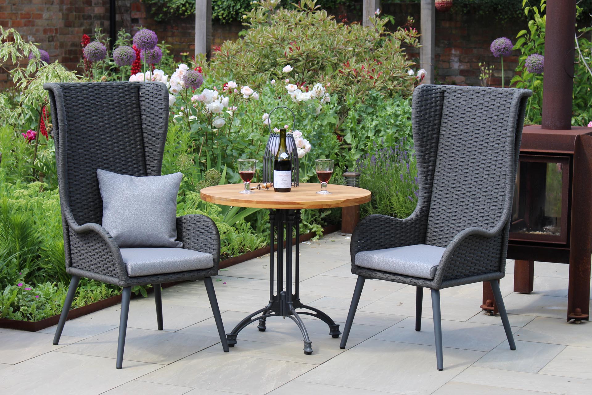 mauritius highback armchair & pigalle and antibes table with scatter cushion