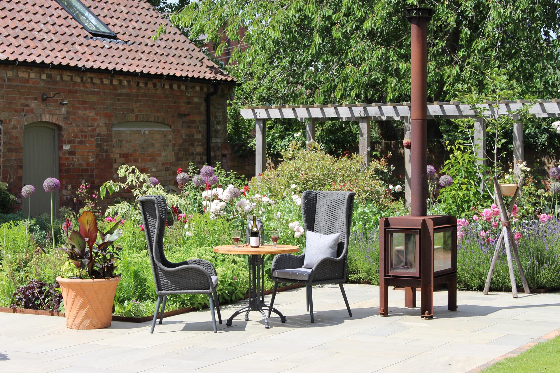 mauritius highback armchair & pigalle and antibes table - large scale shot