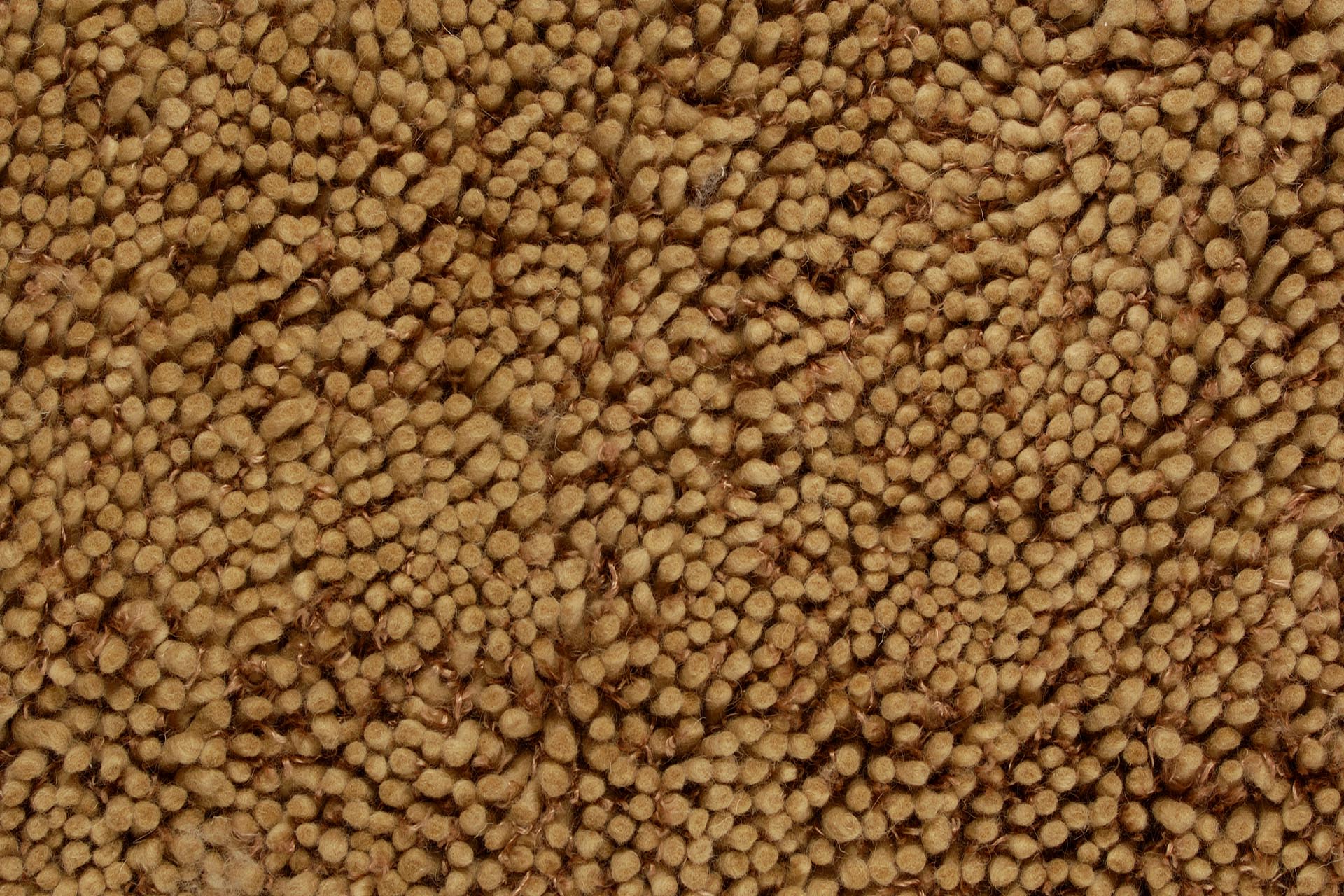 Tube wool rug - caramel, textured pile detail.